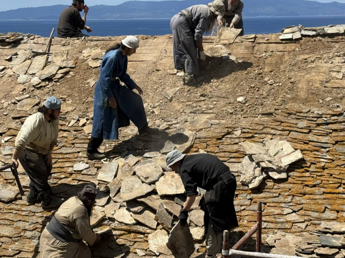 Monks and workers carrying out roof restoration at Holy Docheiariou Monastery